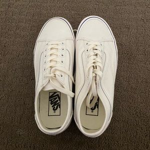 Converse white sneakers with blue stripe. From Converse